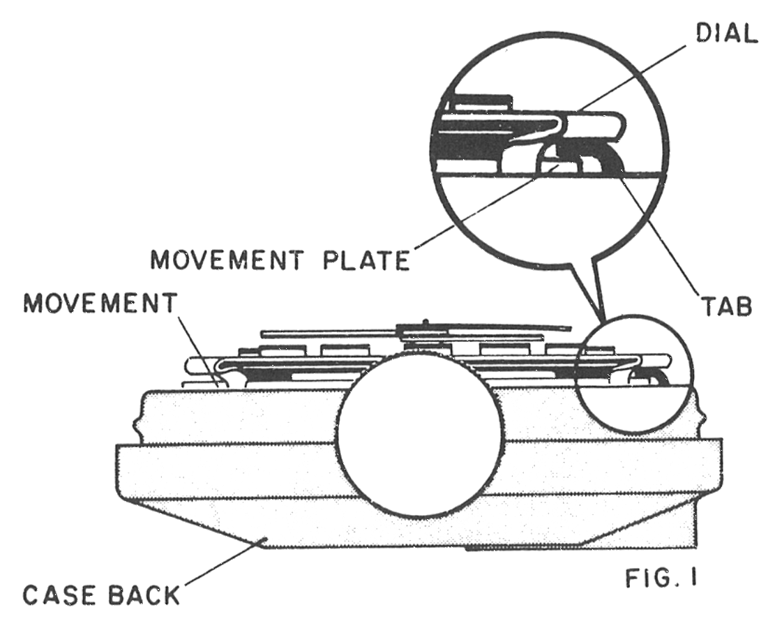 Model 69 movement held by a tab from the case back