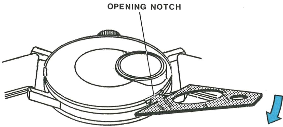 The case back, locating tab and opening notch
