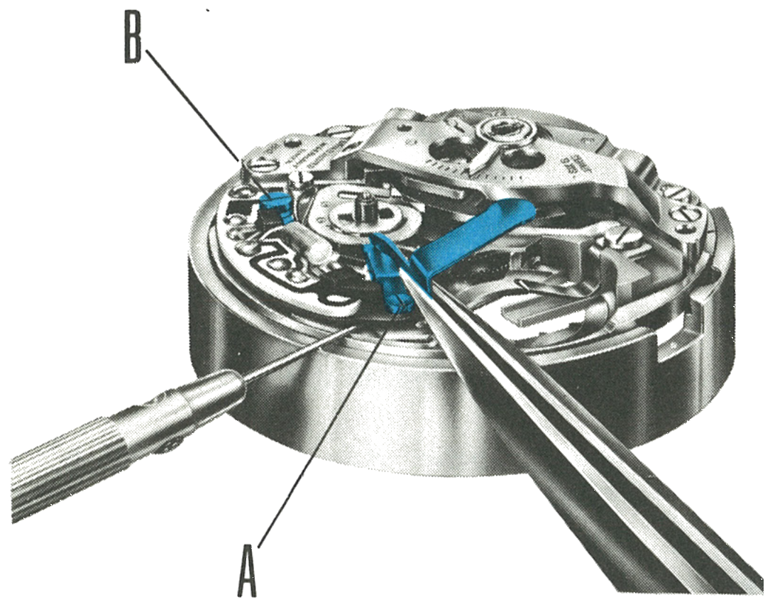 Lifting the switch insulation to insert the energy cell retaining spring